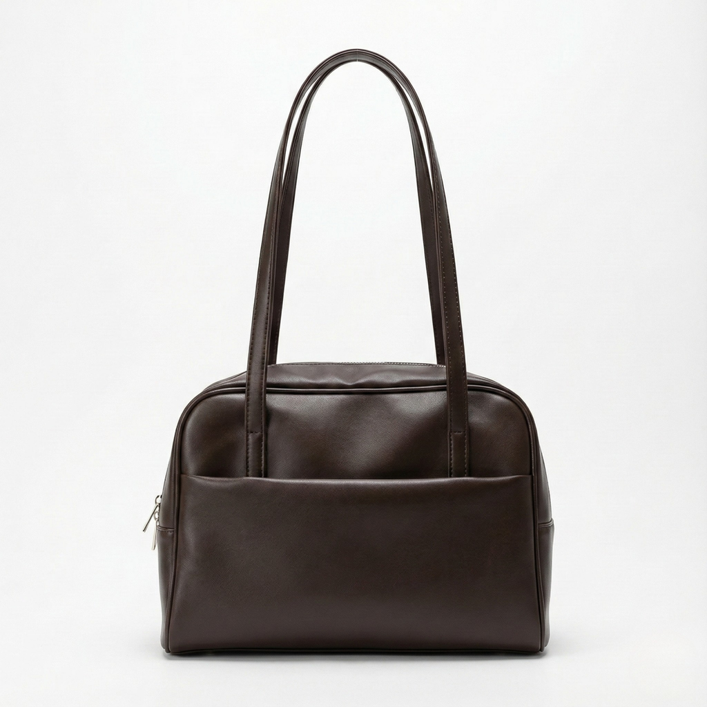 Brown leather handbag on a white background