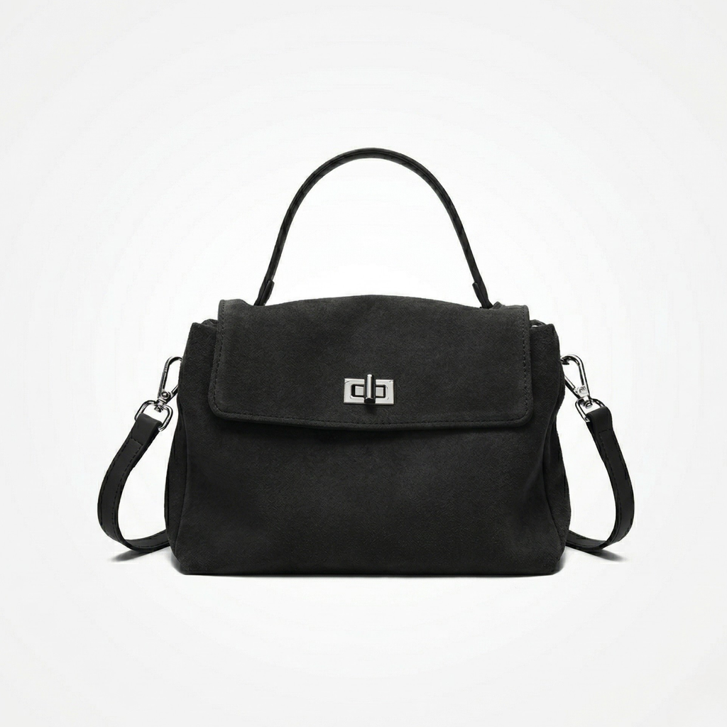 Black handbag with a visible brand logo on a white background