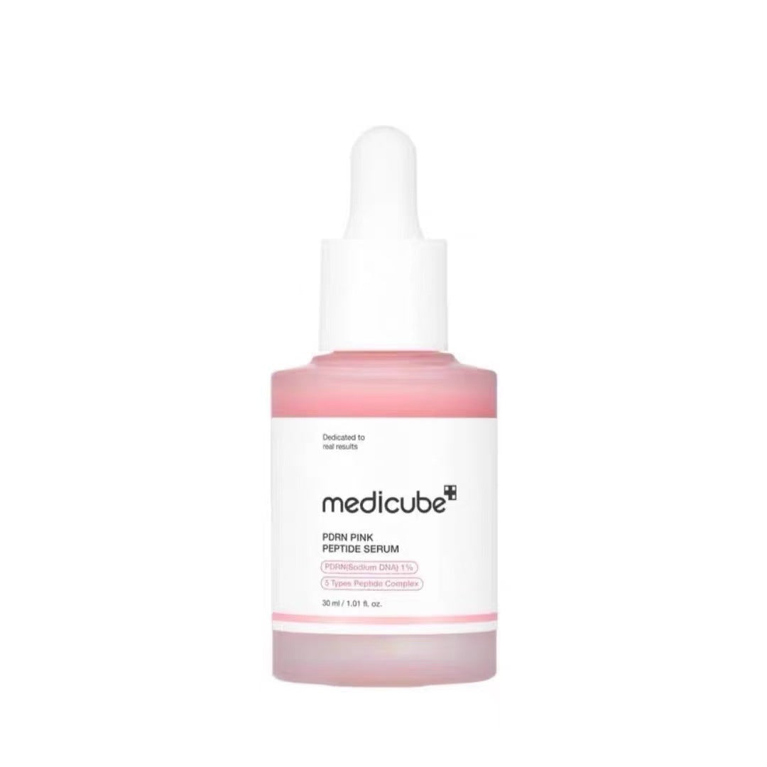 Medicube pink peptide serum bottle on a white background